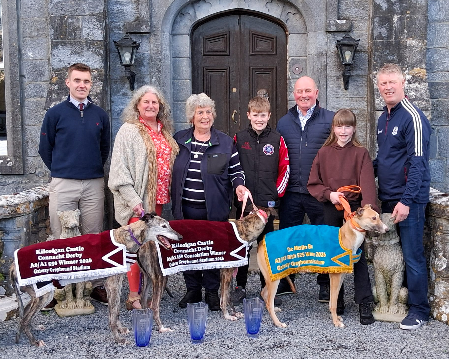 Kilcolgan Castle Connacht Derby Winners 2026 Connections of the 2026 Kilcolgan Castle Connacht Derby winners pictured at Kilcolgan Castle with their greyhounds following success at Galway Greyhound Stadium, proudly displaying their winner and consolation trophies.