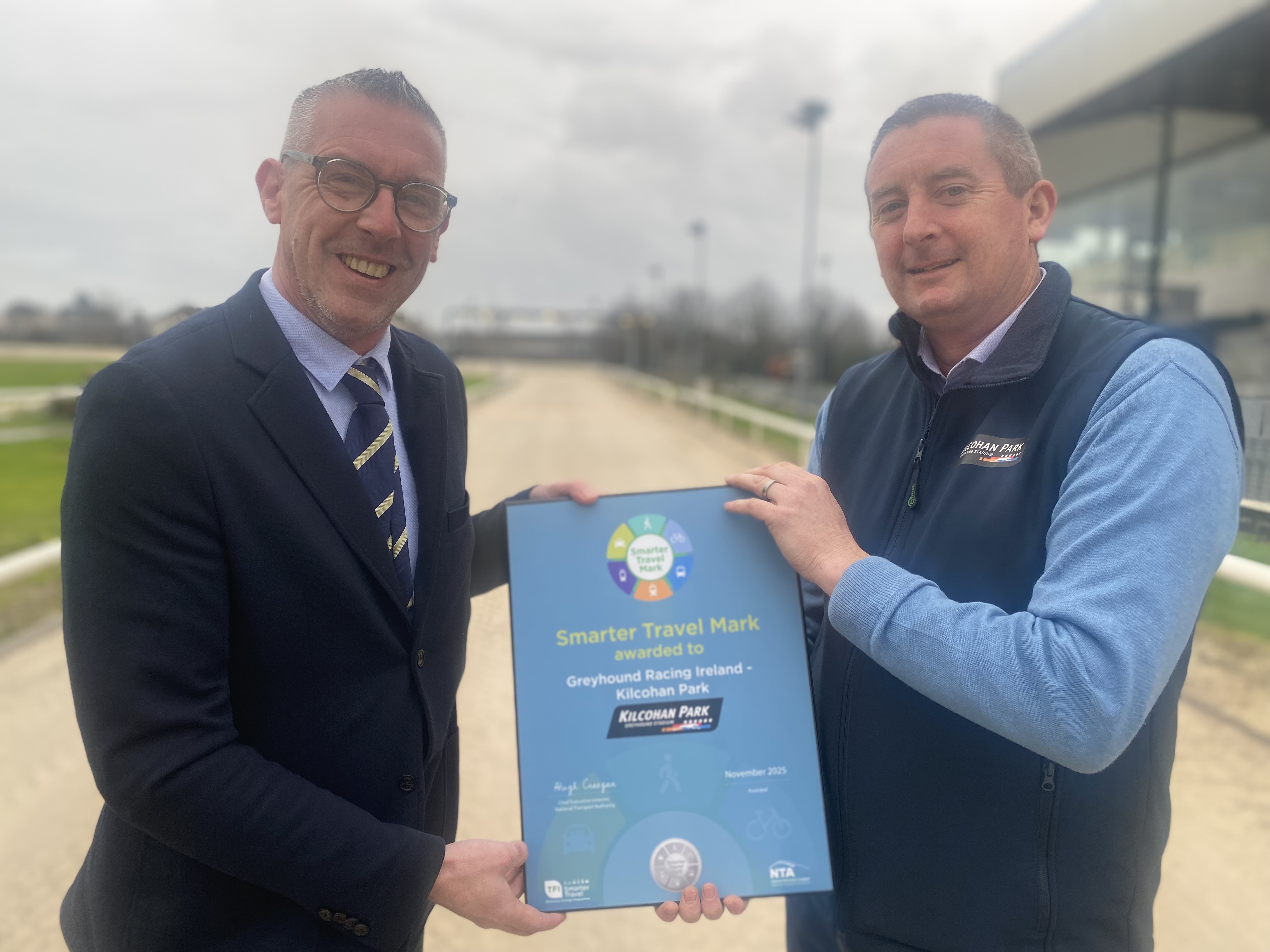 Thomas Ryan (Greyhound Racing Ireland) and Niall O'Malley (Hospitality Manager, Kilcohan Park Greyhound Stadium) on the announcement that Kilcohan Park was awarded the Silver Smarter Travel Award.​​​​​