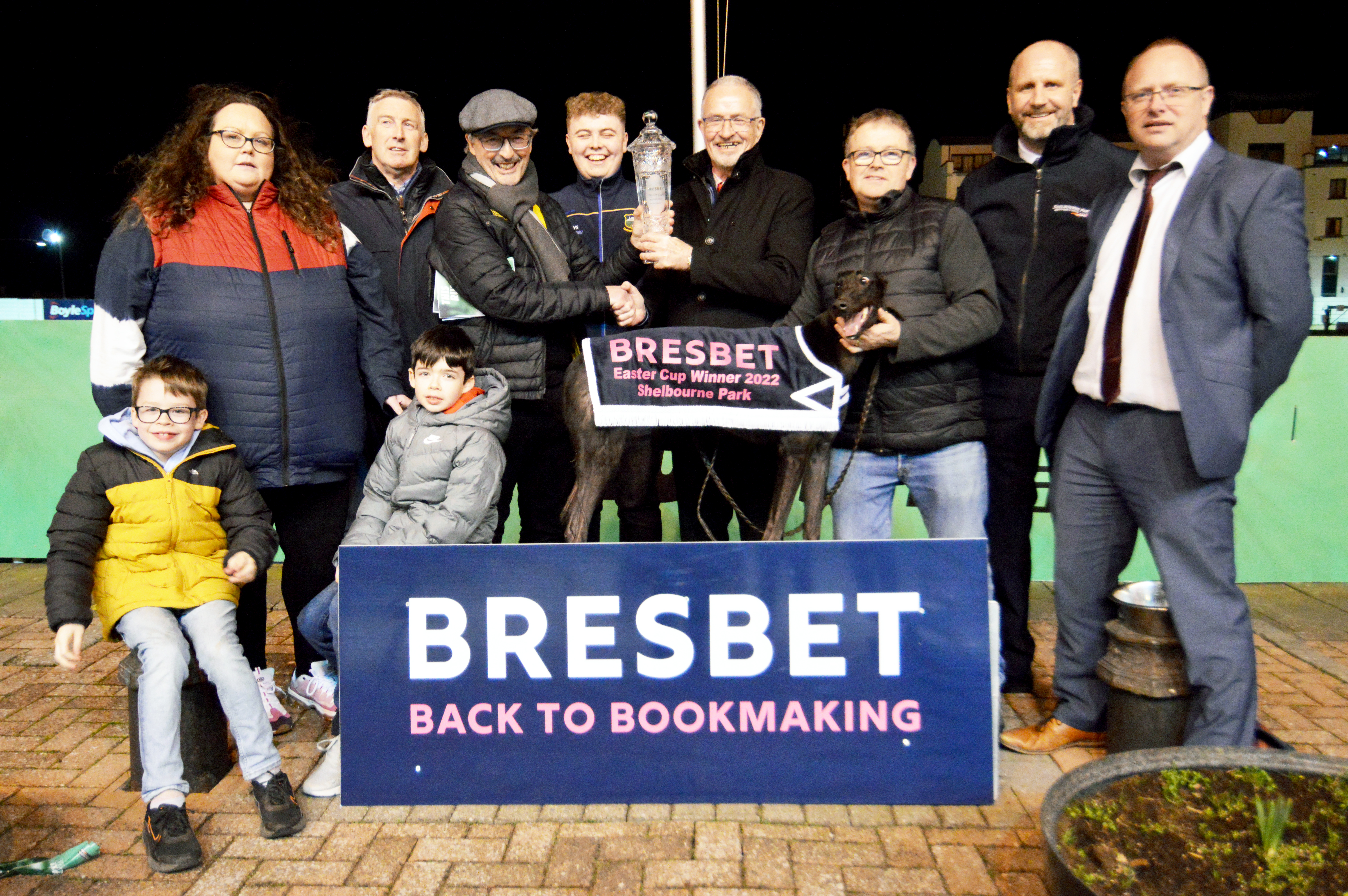 Jonothan Hobbs Rep the sponsors Bresbet Presents the trophy To Peter comerford after “Susie Sapphire “ won the final of the 2022 Bresbet Easter Cup at Shelbourne Park